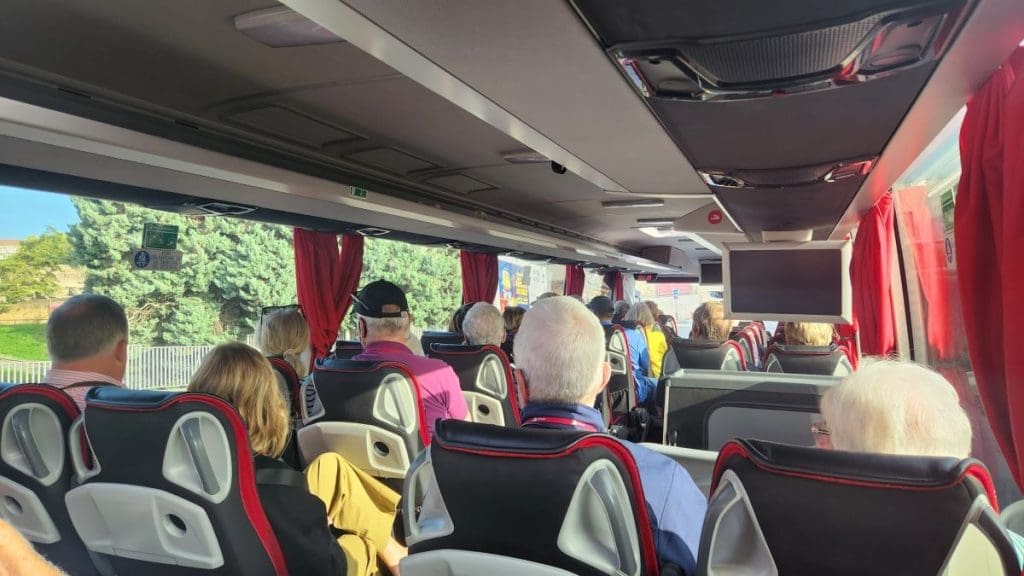 older passengers on a viking cruise line excursion on a viking bus