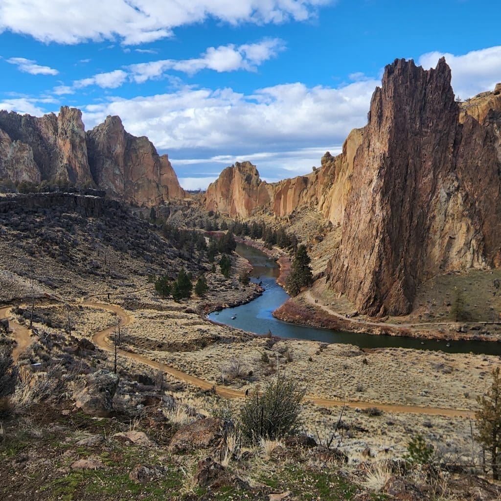 a beautiful view of smith rock state park with river running through the park