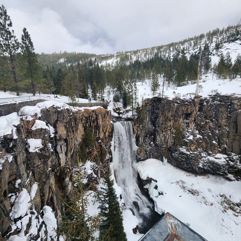 View of Tumalo Falls in Oregon in the winter with snow on the ground